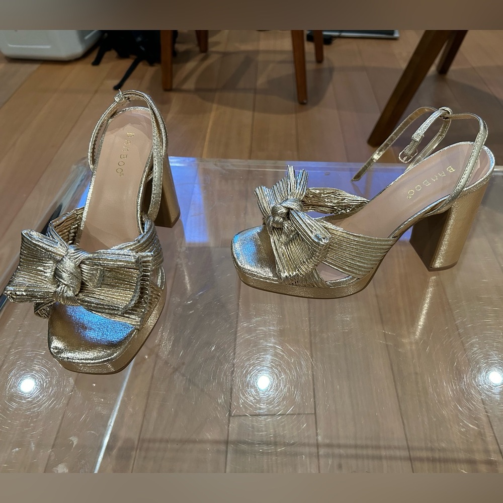 Gold platform bow heels